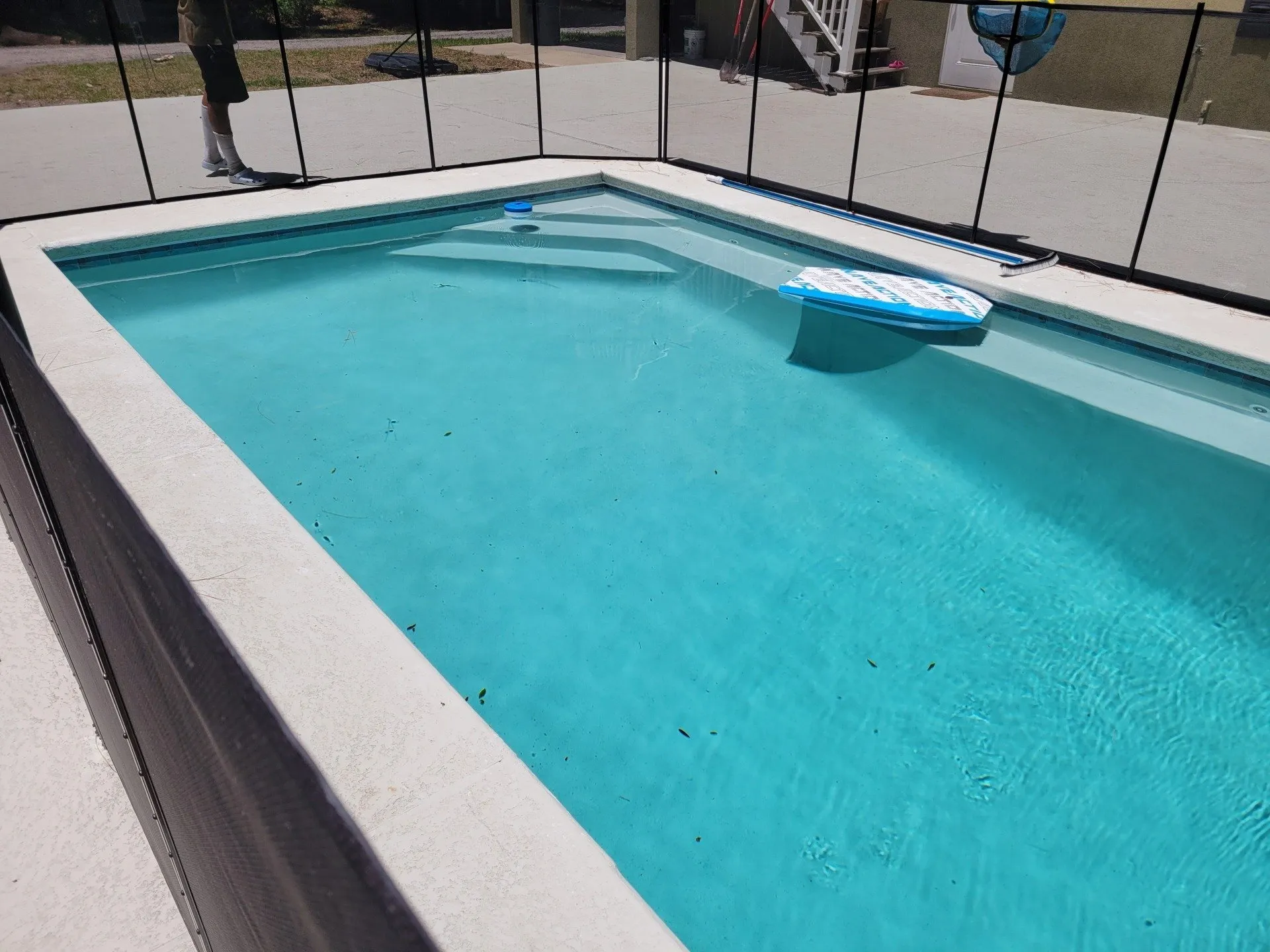 Renovated pool with fresh teal interior finish